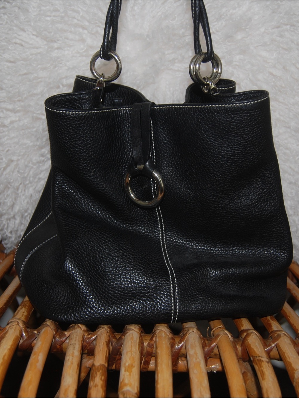 Puntotres Black Leather Shoulder Bag with Silver Ring Accent